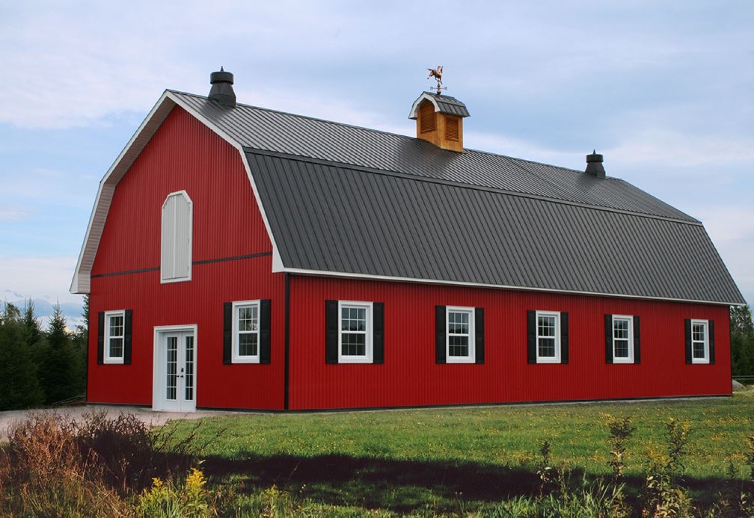 Classic rib metal roof on a red barn