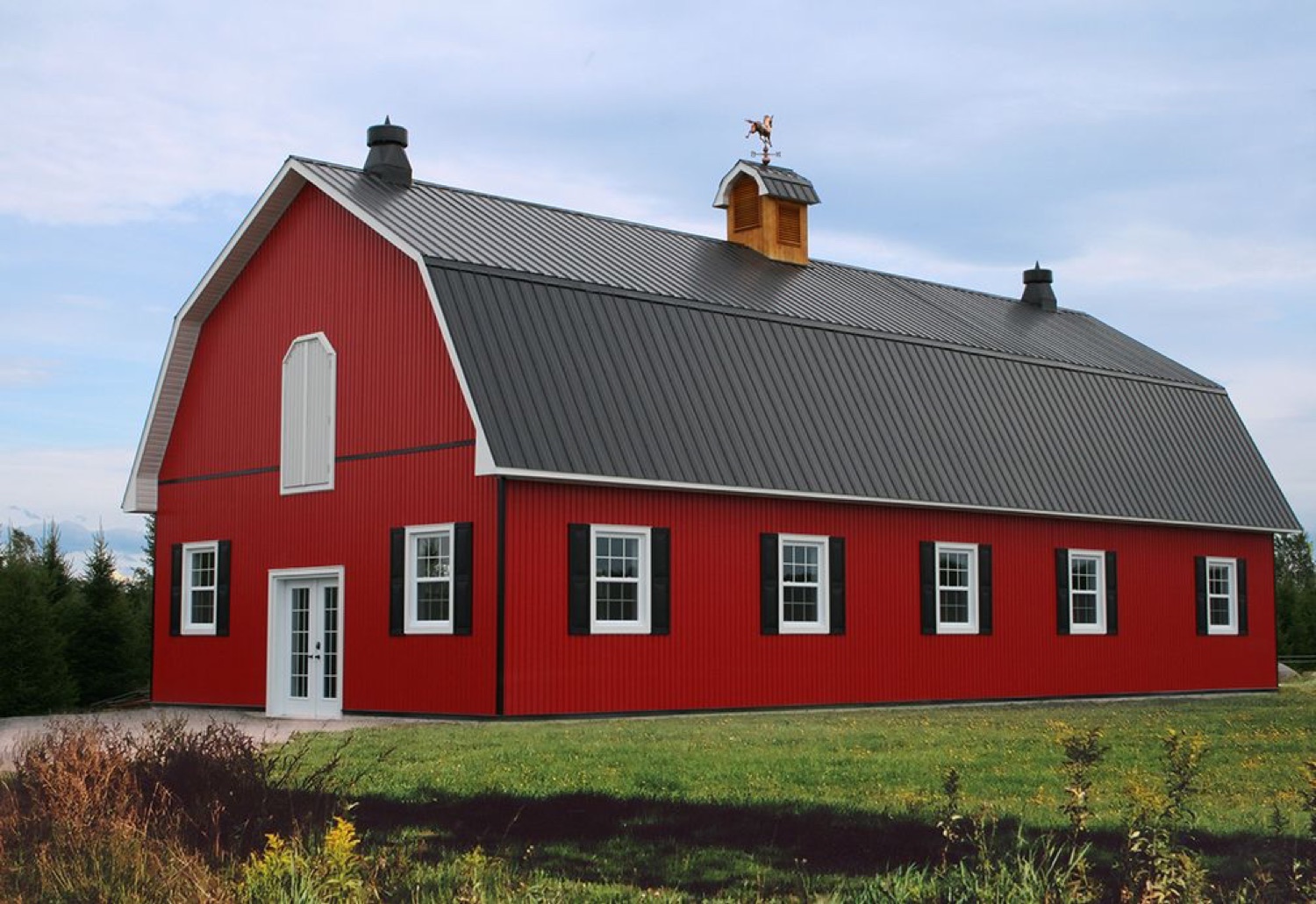 Classic rib metal roof on red barn